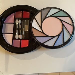 Claire’s makeup kit with eyeshadow, pressed powder, lipgloss